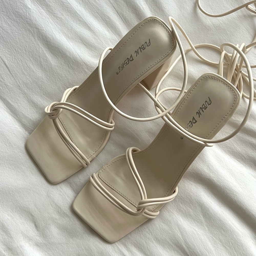 Cream lace up block heels